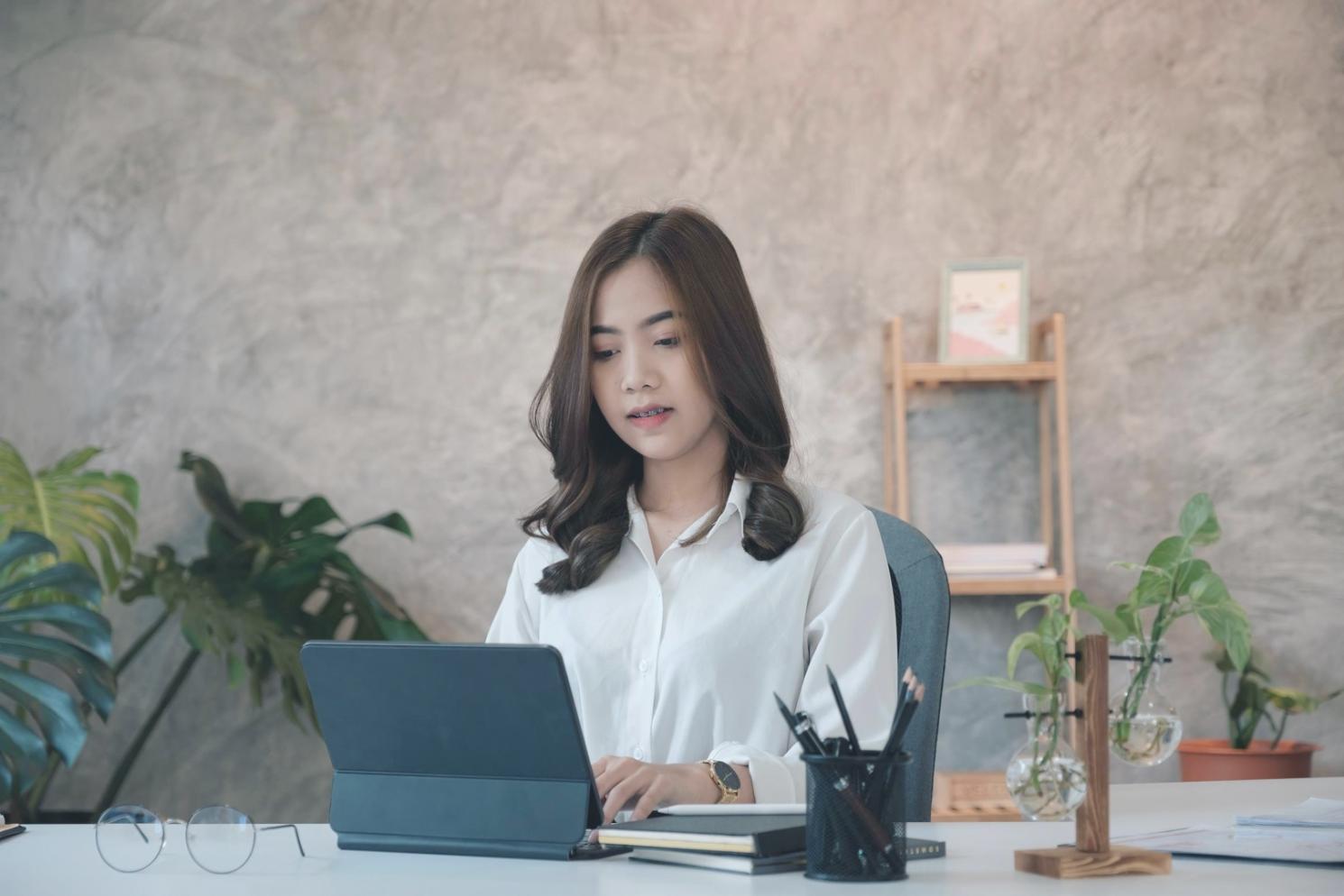 Professional reviewing financial reports and budget analysis